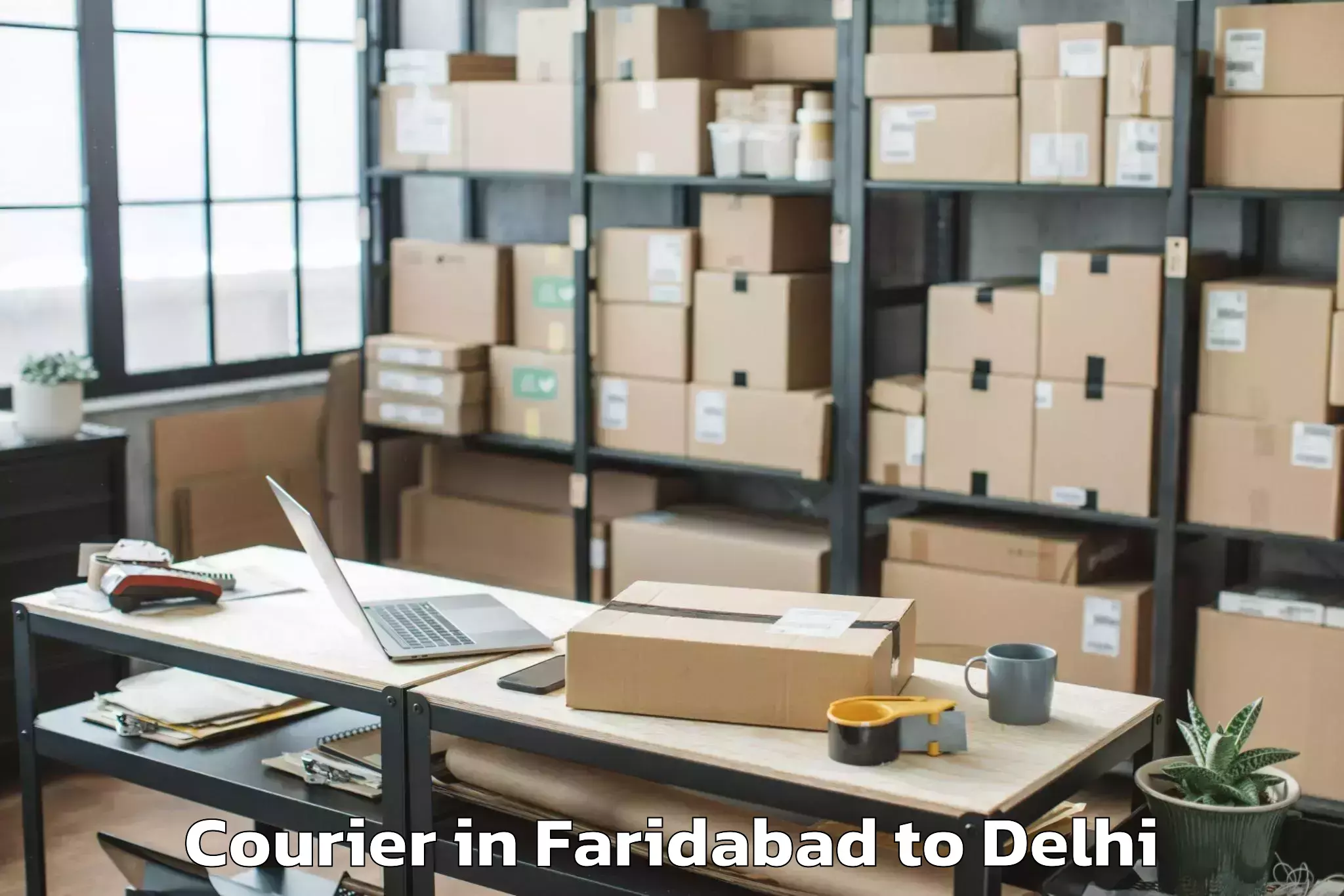 Get Faridabad to Jawaharlal Nehru University Ne Courier